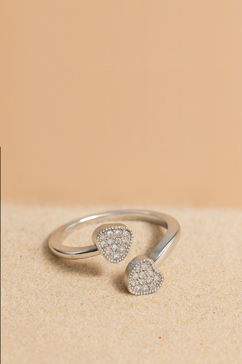 Jewello delicate silver plated and American diamond studded Adjustable finger ring for the women and girls.