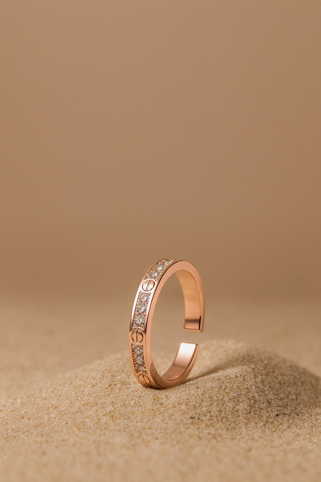 Jewello delightful rose gold and studded American diamond Adjustable finger ring for the women and girls.