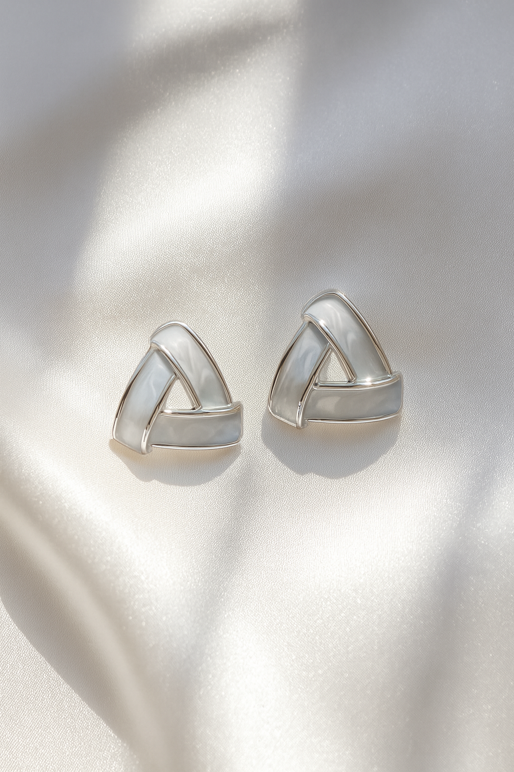 Jewello stylish silver-plated triangle design anti tarnish Korean earring for women and girls.
