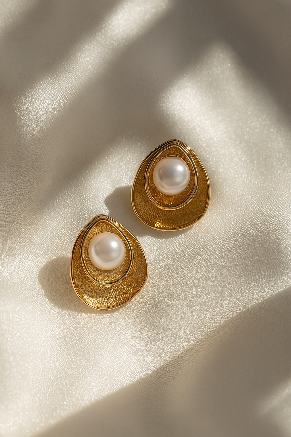 Jewello trendy gold-plated leaf design white pearl stud anti tarnish Korean earring for women and girls.