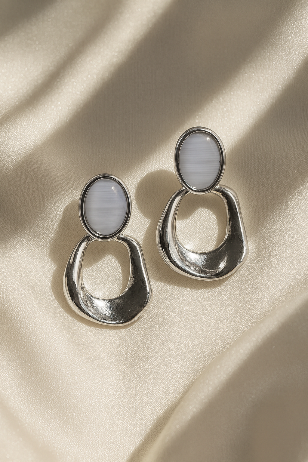 Jewello delicate silver plated and oval shape white stone stud anti tarnish dangle Korean earring for women and girls.