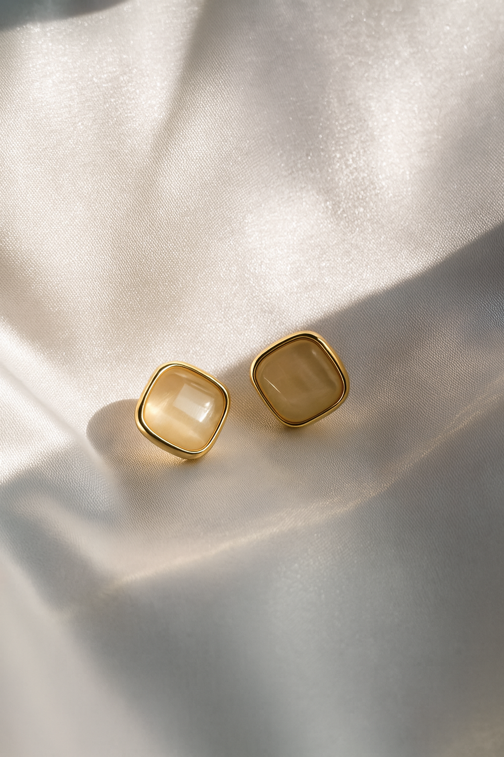 Jewello stylish gold-plated square design and light pink stone stud dainty Korean earring for women and girls.