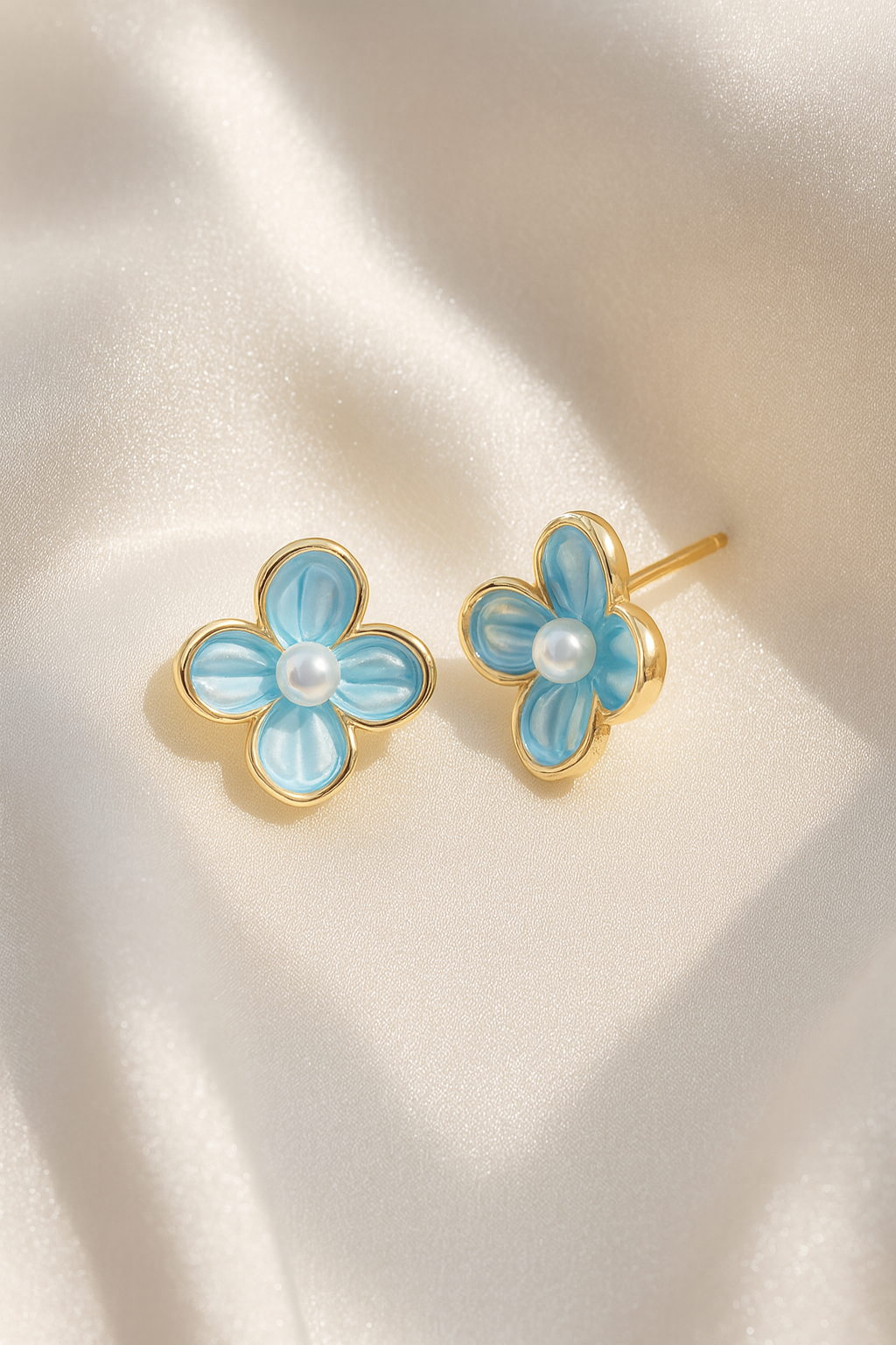 Jewello delicate gold-plated flower design and sky blue dainty anti tarnish Korean earring for women and girls.