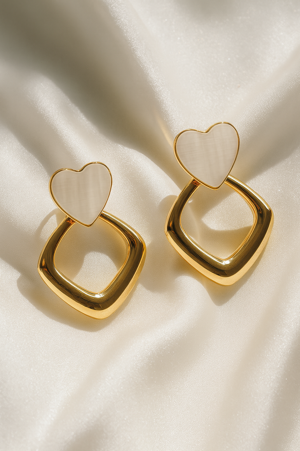 Jewello fancy gold plated with heart design stone stud dangle Korean earring for women and girls.