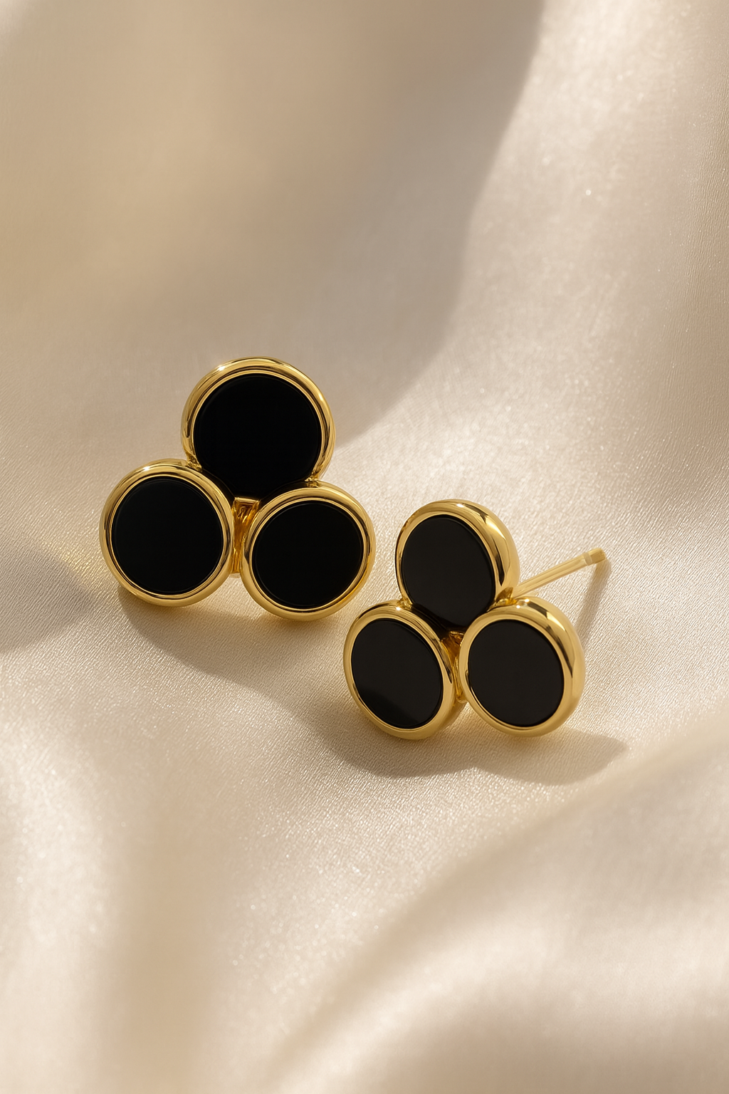 Jewello fashionable gold-plated circular design with black stone stud dainty Korean earring for women and girls.