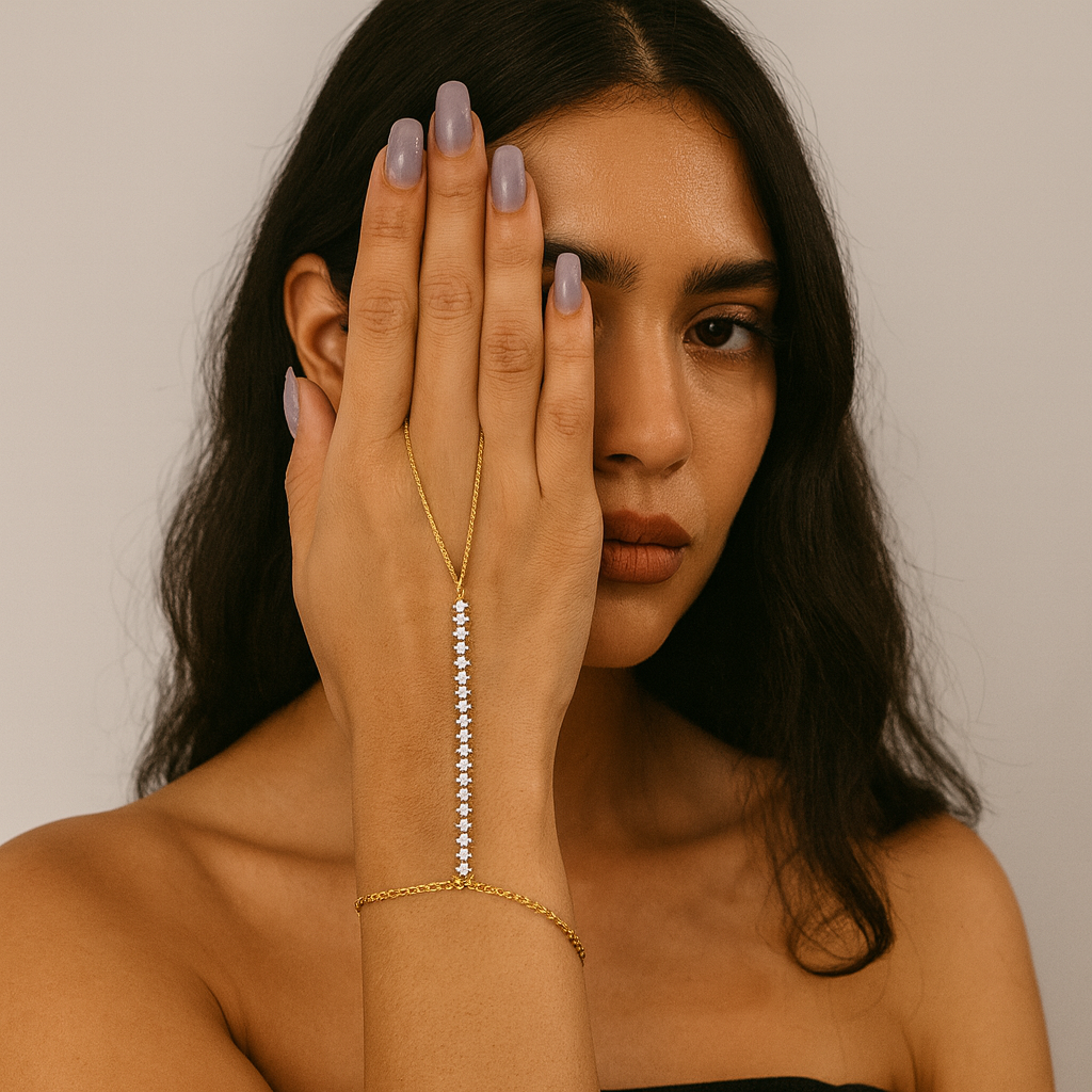 Jewello elegance gold plated with shimmering white stone stud hath Phool, Panja, adjustable hand chain bracelet for women and girls.