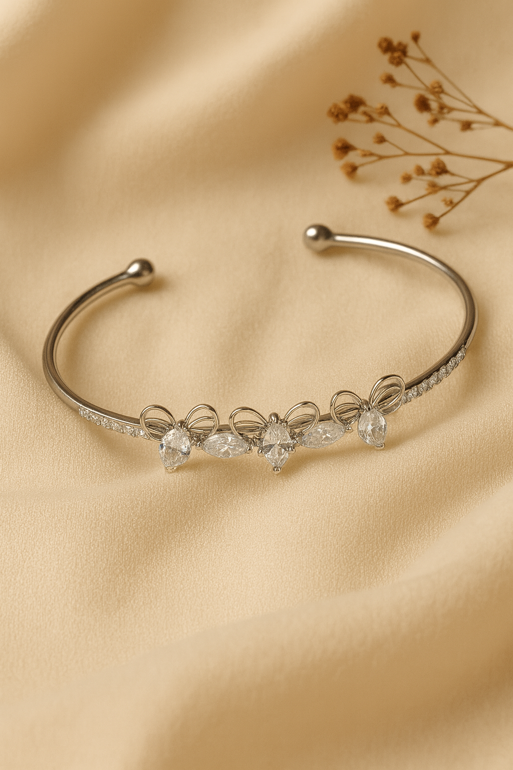 Jewello trendy silver-plated butterfly design with shimmering white stone stud cuff bracelet, Kada bracelet for women and girls.