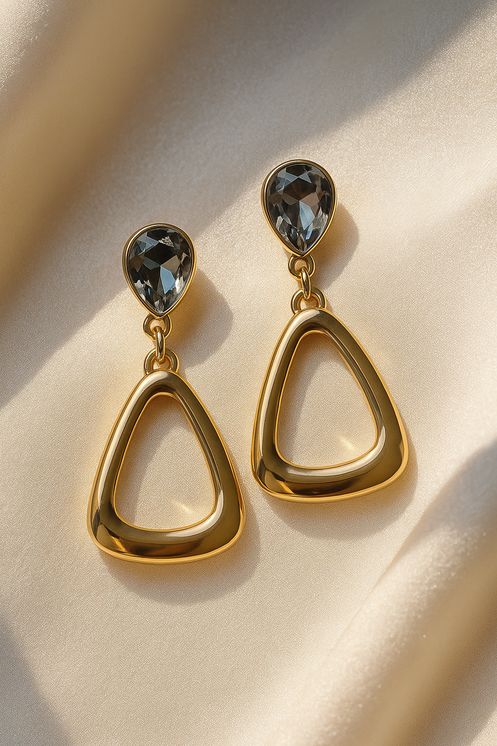 Jewello stylish golden plated tringle shape and drop shape stone stud anti tarnish earring for women and girl.