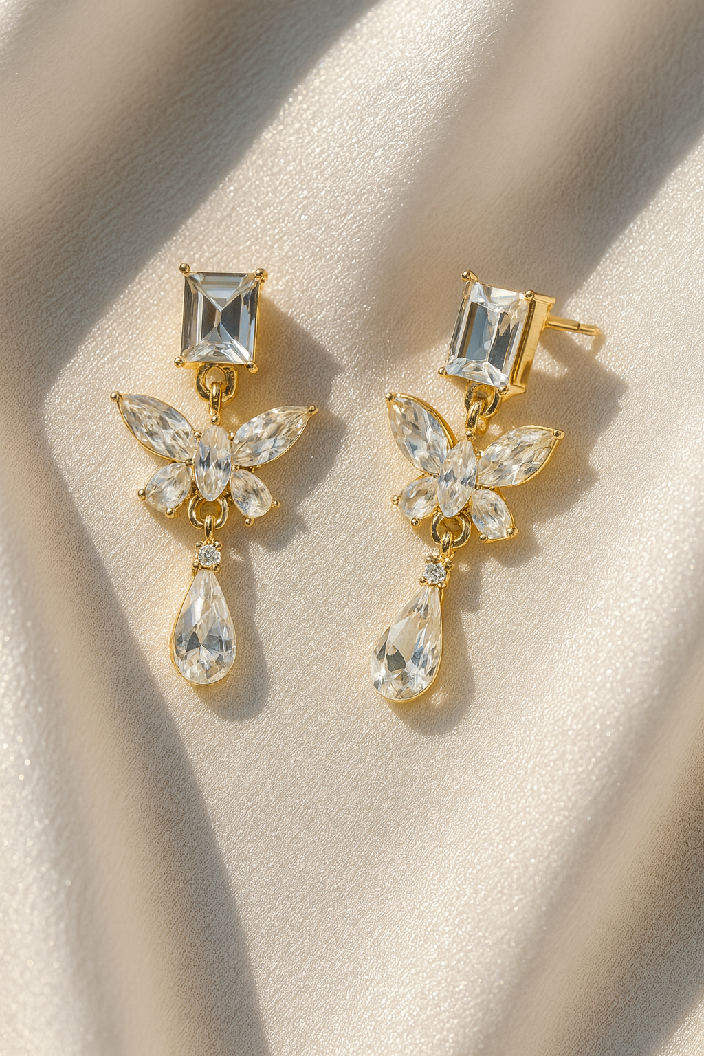 Jewello sterling gold plated butterfly design with white stone stud anti tarnish Korean earring for women and girls.