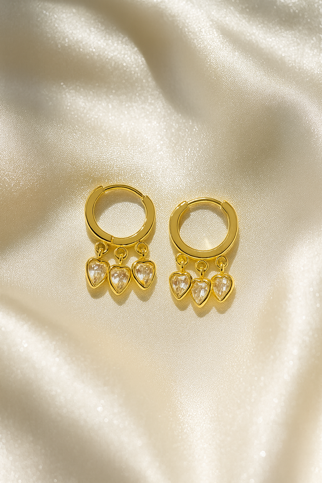 Jewello stylish gold plated with hanging charming heart design stone anti tarnish Korean earring for women and girls.