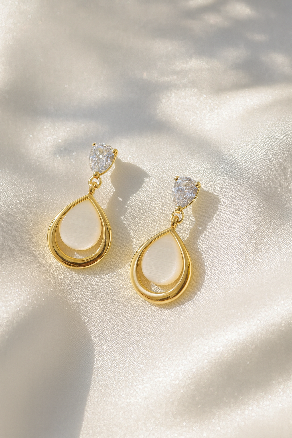 Jewello elegant golden finish drop design and stone stud anti tarnish dangle Korean earring for women and girls.