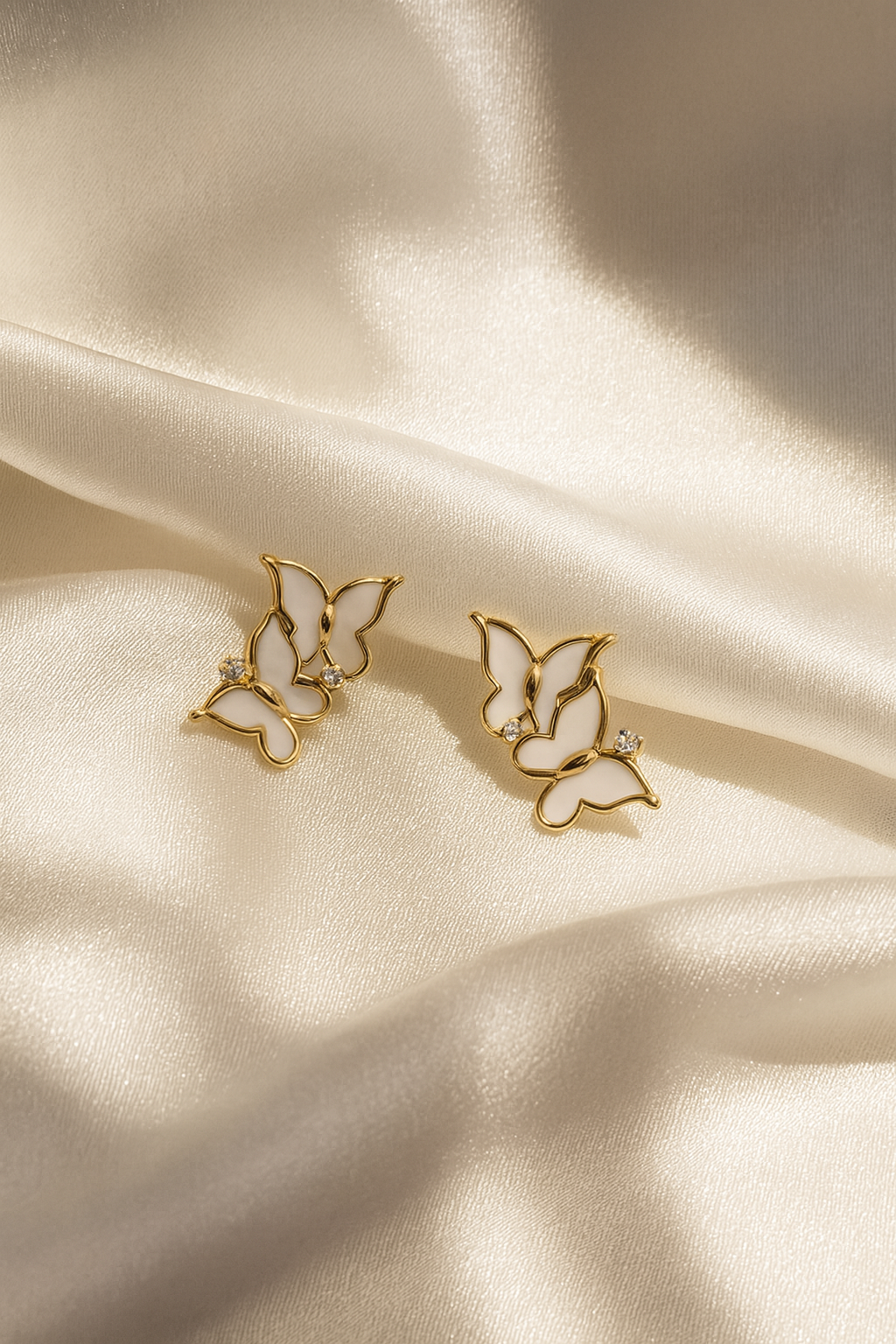 Jewello gold plated butterfly design with light pink stone stud dainty Korean earring for women and girls. Gift for her.