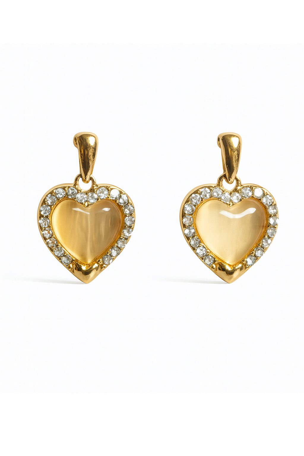 Jewello trendy gold-plated heart design and white stone stud chain pendant set for women and girls.