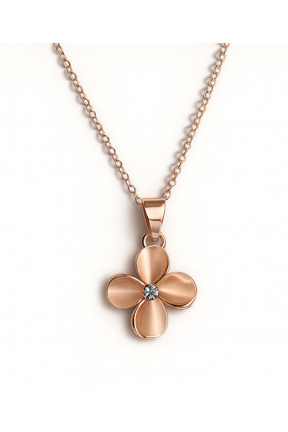 Jewello fashionable rose gold plated floral design with light white stone stud chain pendant set for women and girls.