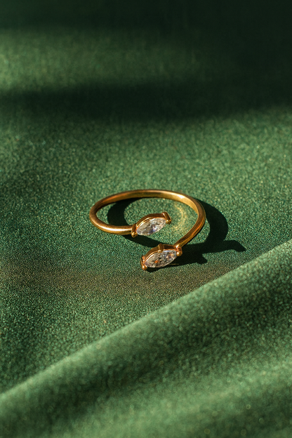 Jewello pretty gold-plated and studded shimmering American diamond Adjustable finger ring for the women and girls.