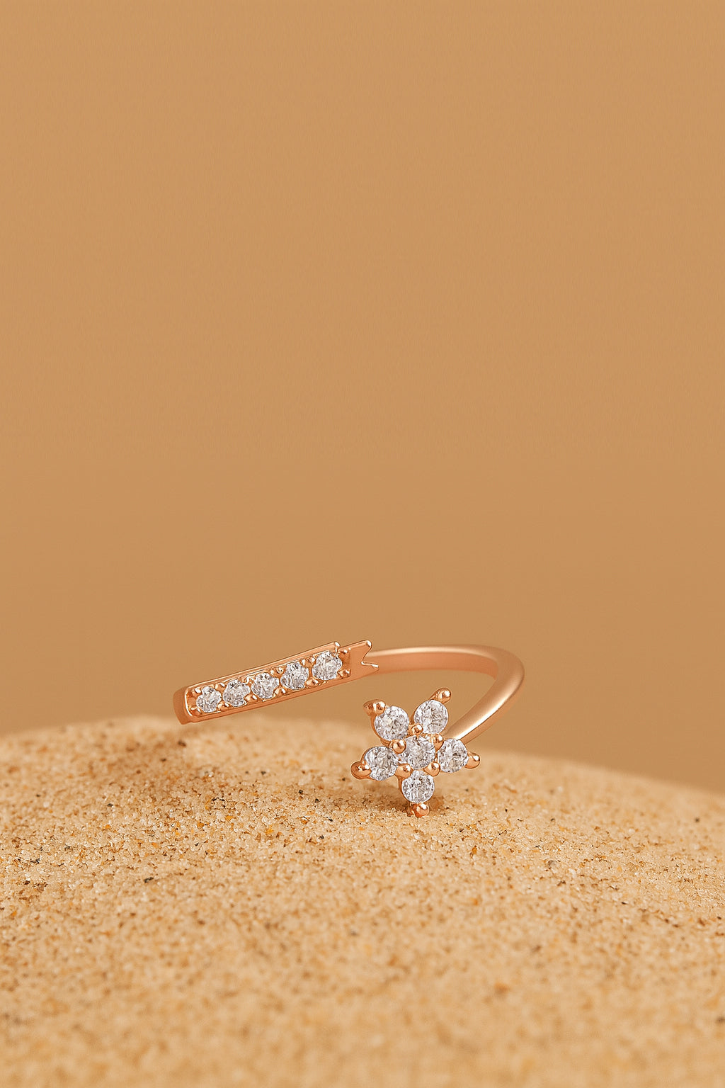 Jewello graceful rose gold-plated floral design with a studded American diamond Adjustable finger ring for the women and girls.