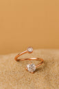 Jewello rose gold plated elite studded shimmering white diamond Adjustable finger ring for the women and girls.