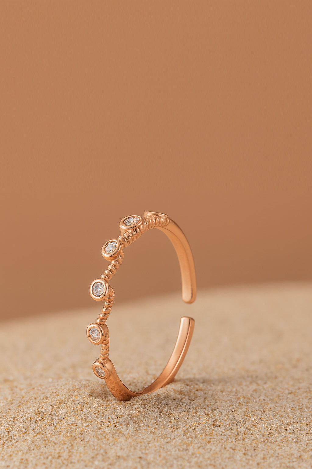 Jewello alluring rose gold plated and studded American diamond Adjustable finger ring for girls and women.