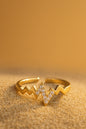 Jewello antique gold plated with a studded American diamond adjustable finger ring for women and girls.