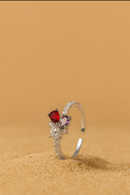 Jewello fascinating silver plated and studded red, purple shimmering stone American diamond Adjustable finger ring for women and girls.
