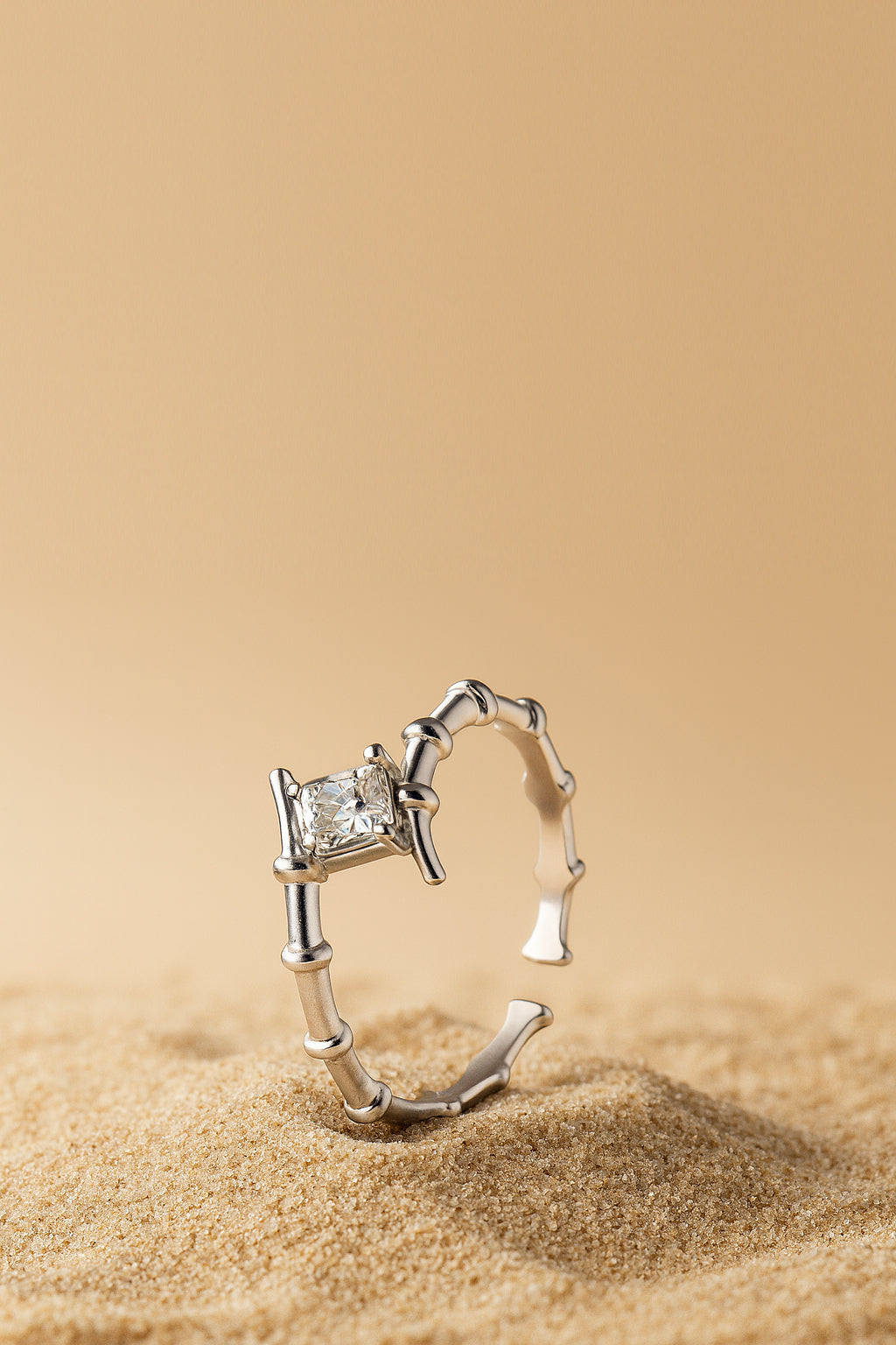 Jewello delicate silver plated and studded Shimmering American diamond adjustable finger ring for women and girls.