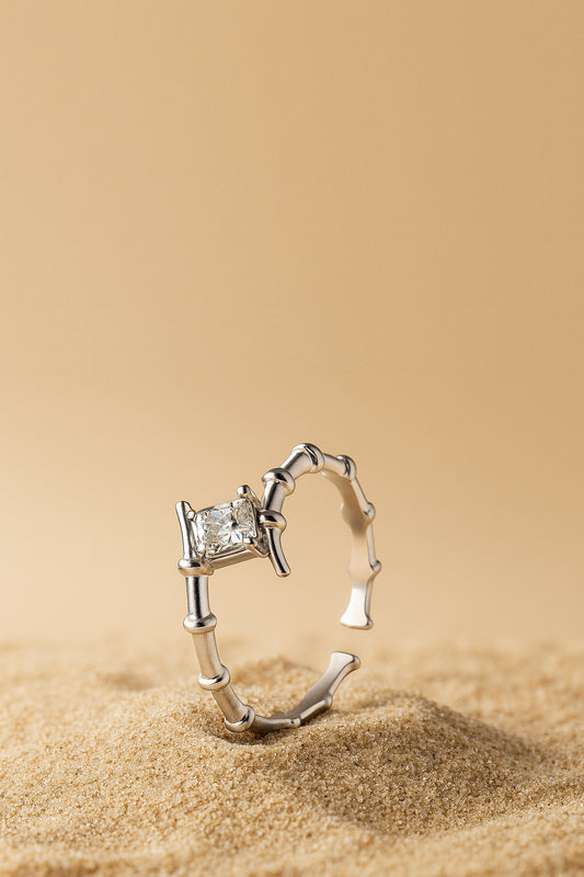 Jewello delicate silver plated and studded Shimmering American diamond adjustable finger ring for women and girls.