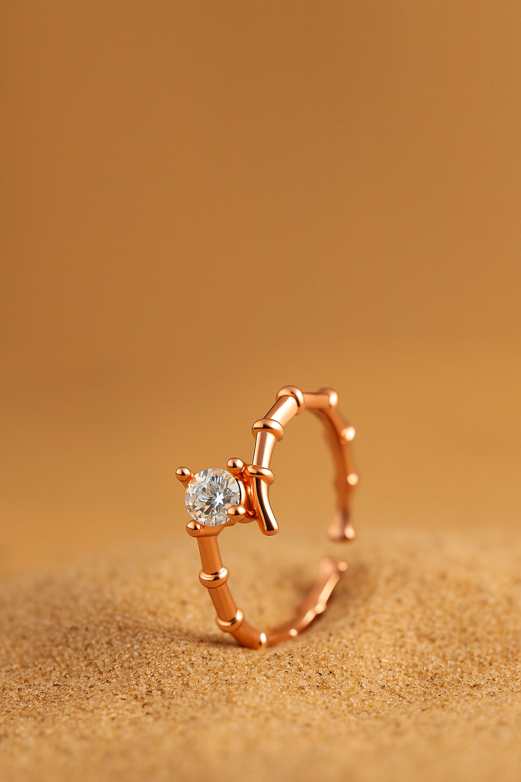 Jewello stylish and trendy rose gold plated and studded shimmering American diamond Adjustable finger ring for women and girls.