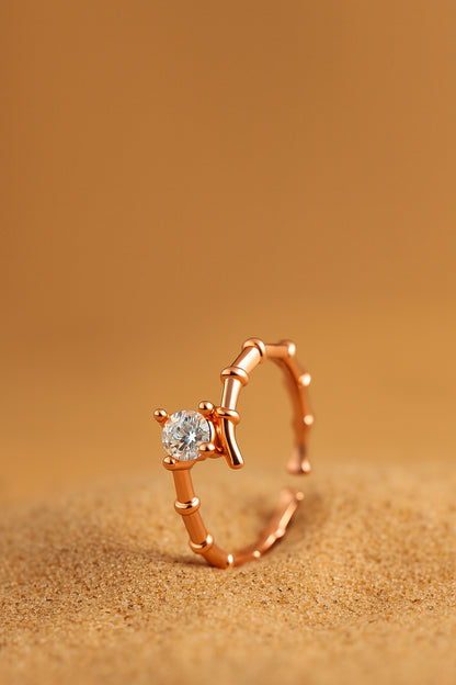Jewello stylish and trendy rose gold plated and studded shimmering American diamond Adjustable finger ring for women and girls.