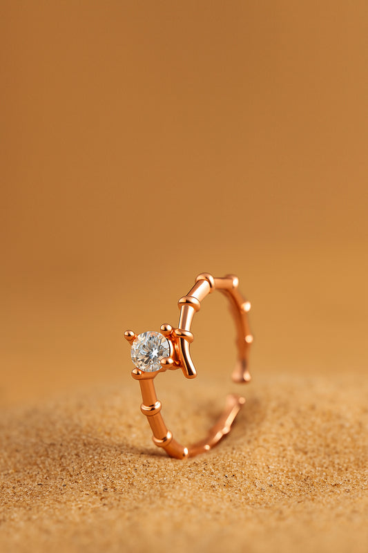 Jewello stylish and trendy rose gold plated and studded shimmering American diamond Adjustable finger ring for women and girls.