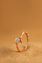 Jewello stylish and trendy rose gold plated and studded shimmering American diamond Adjustable finger ring for women and girls.