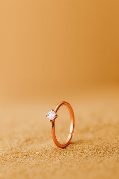 Jewello delicate rose gold plated and studded shimmering white stone Adjustable finger ring for women and girls.