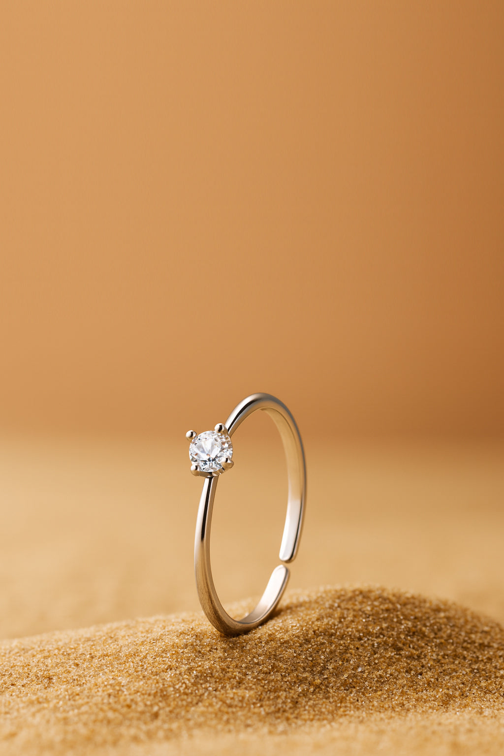 Jewello stylish and trendy silver plated and studded shimmering white stone adjustable finger ring for women and girls.