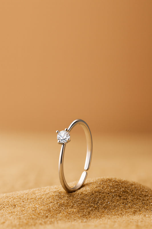 Jewello stylish and trendy silver plated and studded shimmering white stone adjustable finger ring for women and girls.