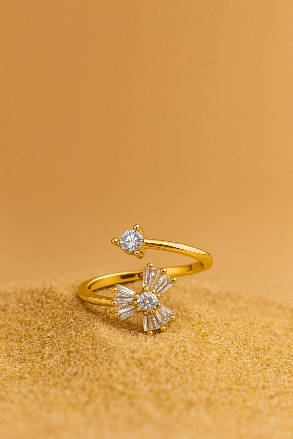 Jewello elegant gold-plated floral design and studded shimmiring white stone Adjustable finger ring for women and girls.