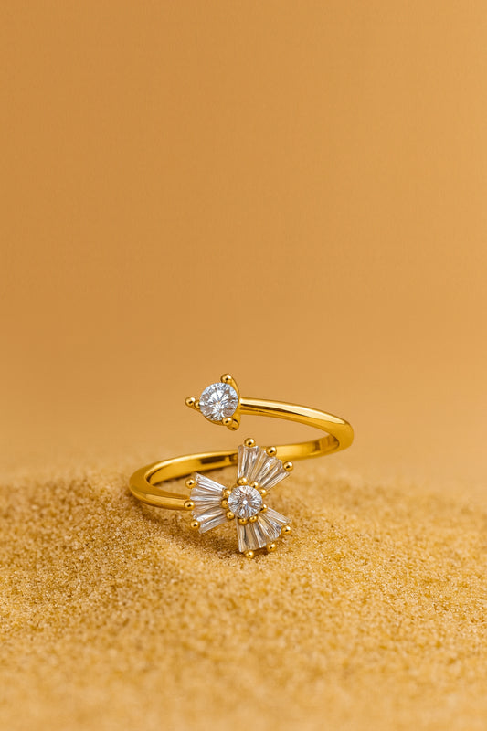 Jewello elegant gold-plated floral design and studded shimmiring white stone Adjustable finger ring for women and girls.