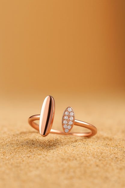 Jewello showcases a classy gold-plated adjustable finger ring, featuring an elegant oval shape studded with shimmering American diamonds. This timeless piece adds a luxurious touch to any outfit, perfect for women and girls. Its adjustable.