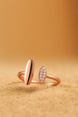 Jewello showcases a classy gold-plated adjustable finger ring, featuring an elegant oval shape studded with shimmering American diamonds. This timeless piece adds a luxurious touch to any outfit, perfect for women and girls. Its adjustable.