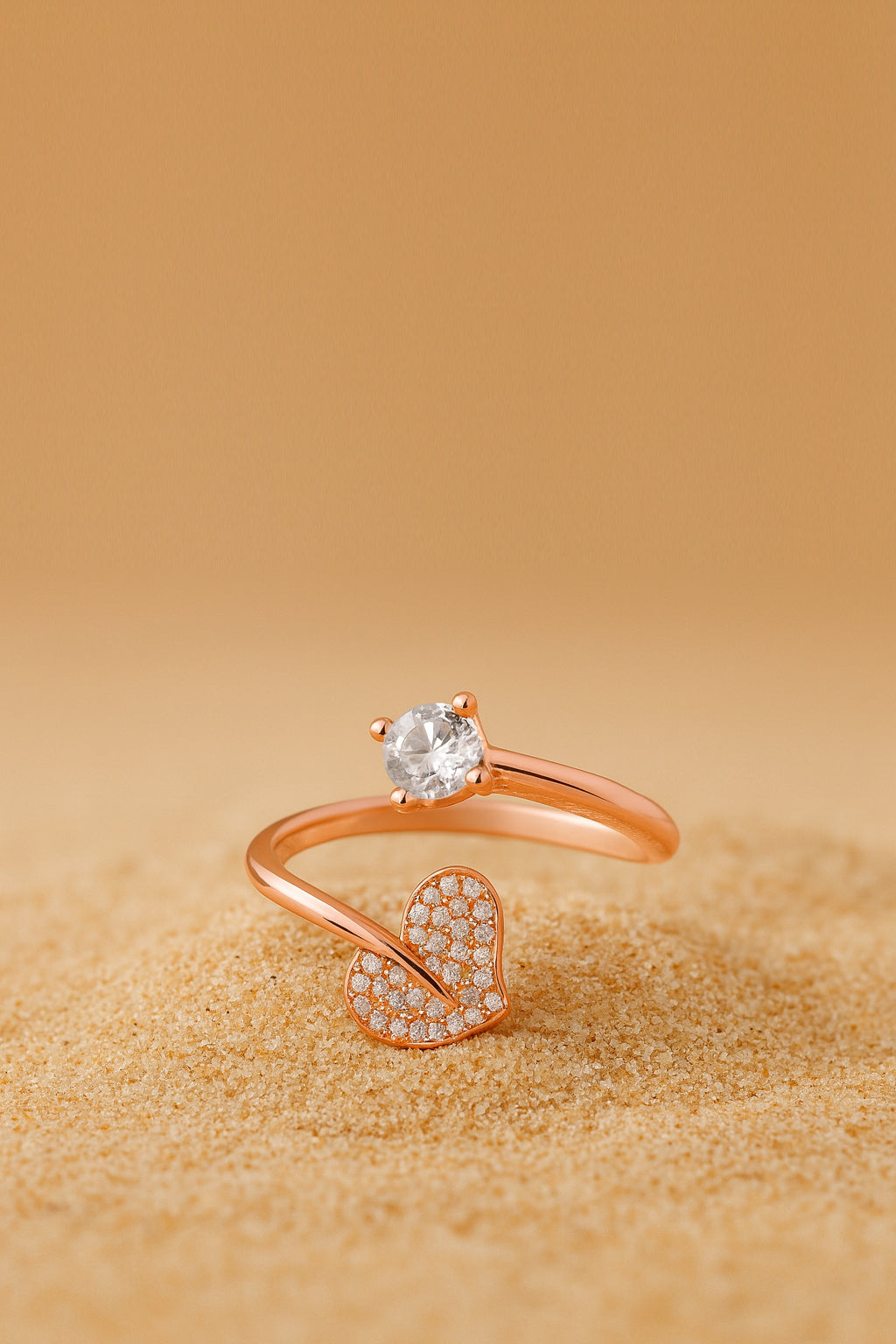 Jewello charming rose gold plated heart shape design and studded American diamond Adjustable finger ring for women and girls.