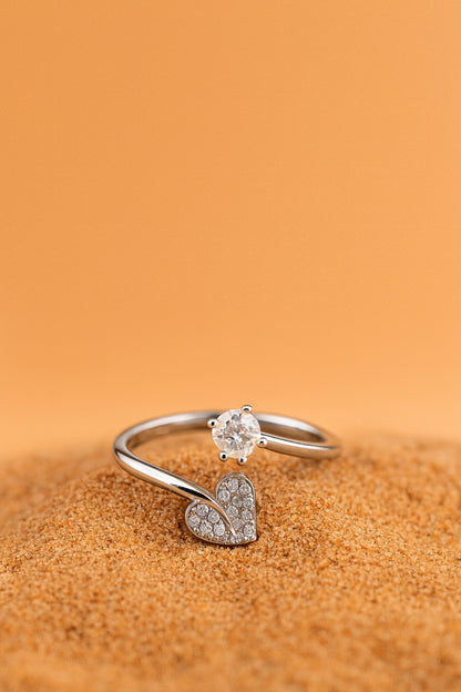 Jewello trendy silver-plated heart shape design and studded shimmering American diamond Adjustable finger ring for women and girls.