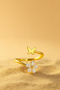 Jewello glorious gold-plated floral design and studded shimmering white diamond Adjustable finger ring for women and girls.
