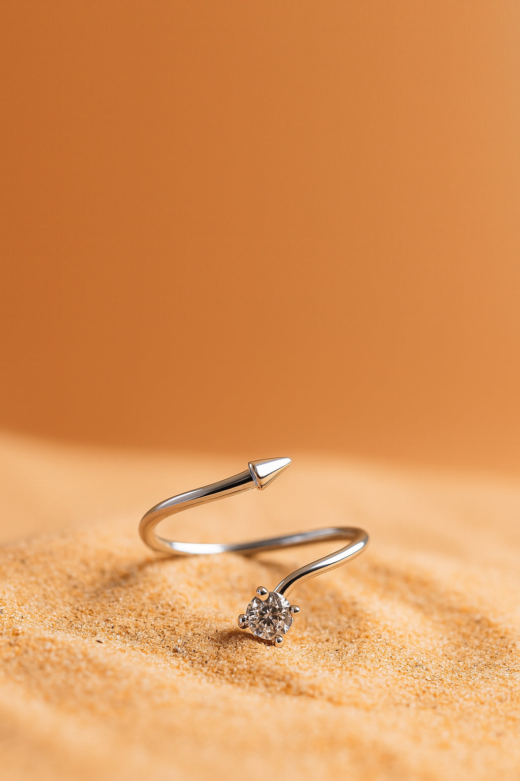 Jewello fascinating silver plated and studded shimmering white stone Adjustable finger ring for women and girls.