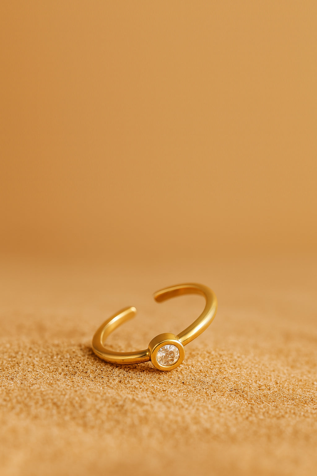 Jewello simple and stylish gold plated and striking white American diamond Adjustable finger ring for women and girls.