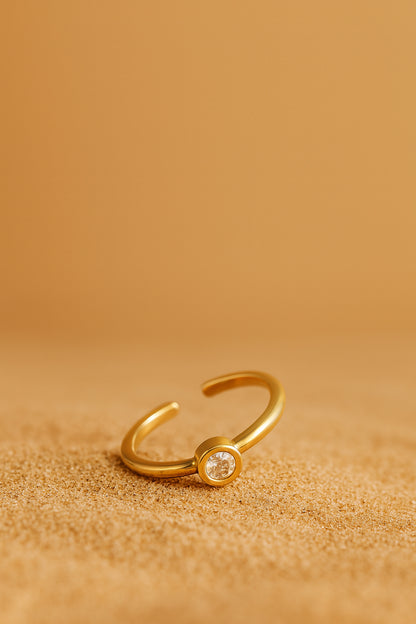 Jewello simple and stylish gold plated and striking white American diamond Adjustable finger ring for women and girls.
