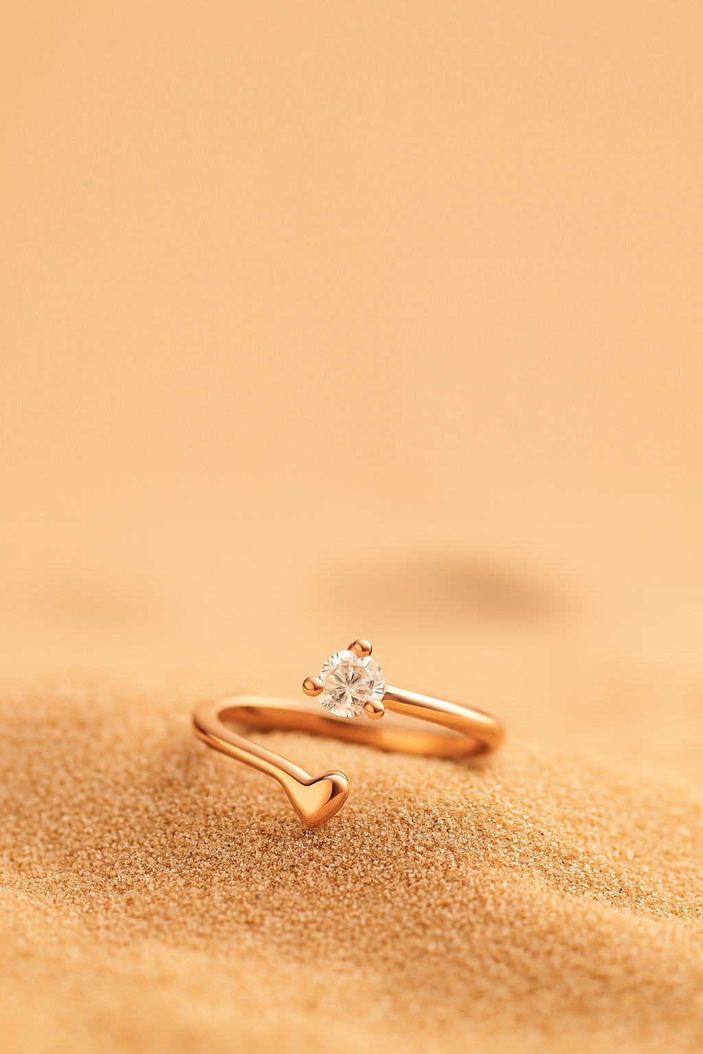 Jewello alluring tiny heart design rose gold plated and studded American diamond Adjustable finger ring for women and girls.
