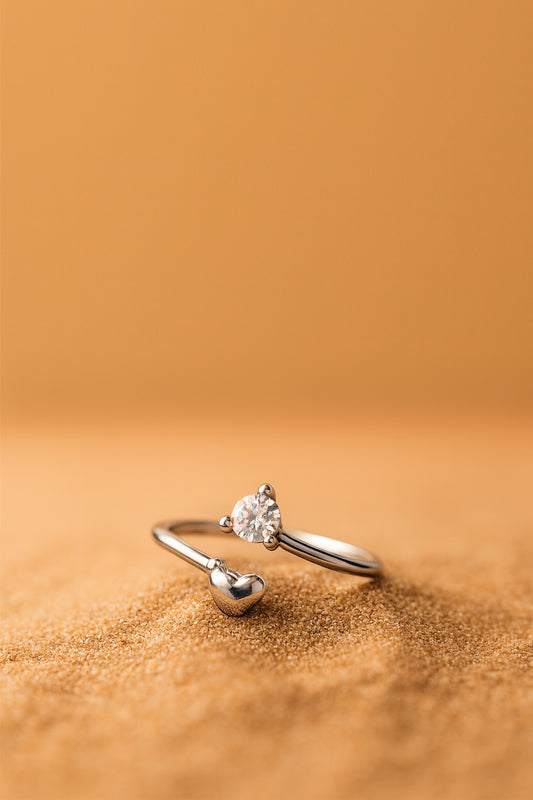 Jewello latest and fancy tiny heart design silver plated and studded American diamond Adjustable finger ring for women and girls.