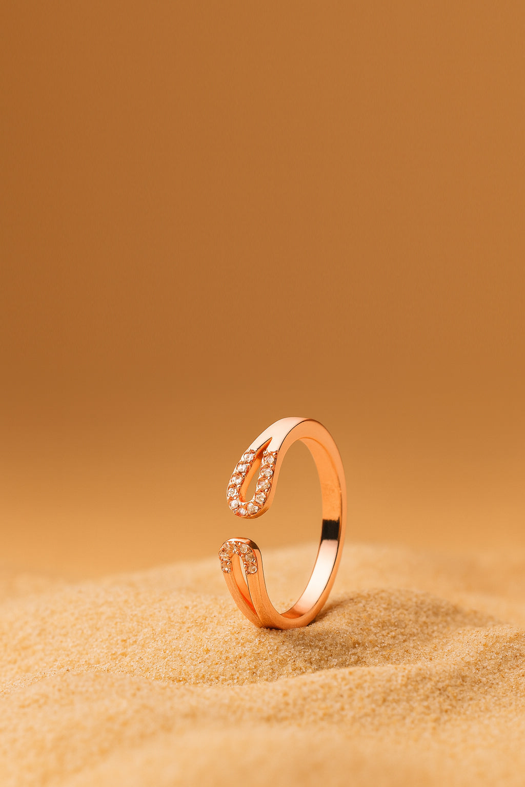 Jewello  classic rose gold plated and studded American diamond Adjustable finger ring for women and girls.