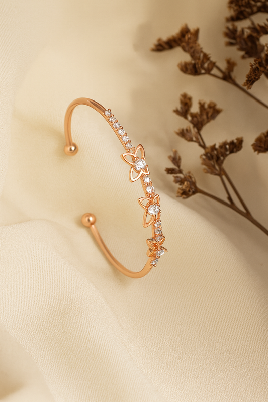 Jewello trendy rose gold plated with shimmering stone stud cuff bracelet, Kada bracelet for women and girls.