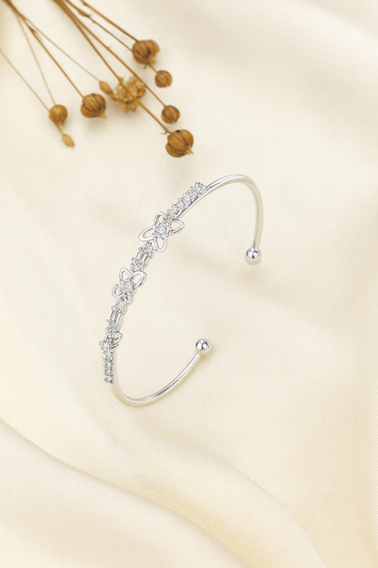Jewello trendy silver plated with shimmering white stone stud cuff bracelet, Kada bracelet for women and girls.