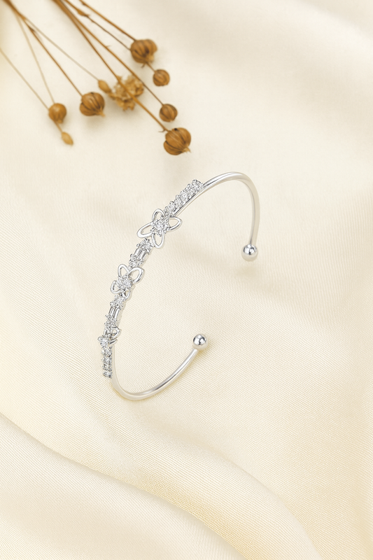 Jewello trendy silver plated with shimmering white stone stud cuff bracelet, Kada bracelet for women and girls.
