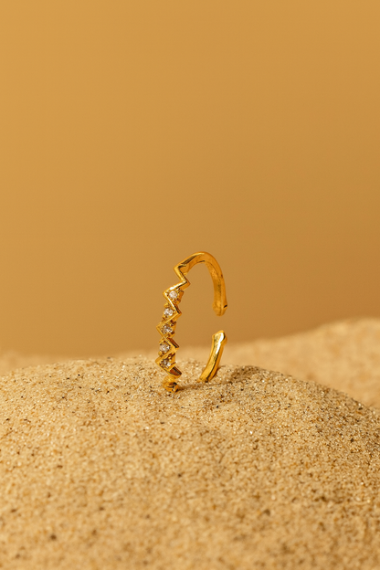 Jewello shimmering zig-zag gold plated with a studded American diamond Adjustable finger ring for women and girls.